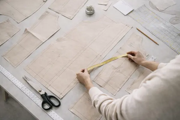 pattern making for clothing production using paper and tools