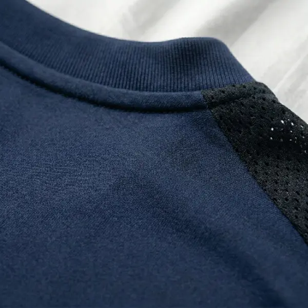 Close-up of football jersey inner fabric texture and seam construction for comfort Close-up of football jersey inner fabric texture and seam construction for comfort