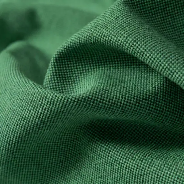 Tekstur khas bahan Oxford dengan anyaman basket weave terlihat dari jarak dekat Tekstur khas bahan Oxford dengan anyaman basket weave terlihat dari jarak dekat