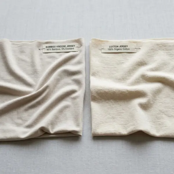 Side-by-side comparison of bamboo viscose jersey and cotton jersey fabrics Side-by-side comparison of bamboo viscose jersey and cotton jersey fabrics