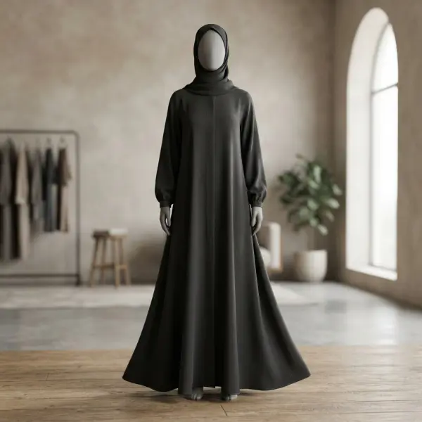 Siluet abaya dengan kain flowy yang memperlihatkan efek jatuh dan lipatan lembut