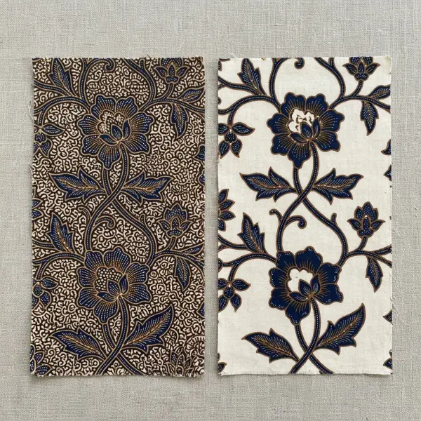 Perbandingan bidang motif batik dengan isen-isen padat dan ruang terbuka yang seimbang Perbandingan bidang motif batik dengan isen-isen padat dan ruang terbuka yang seimbang