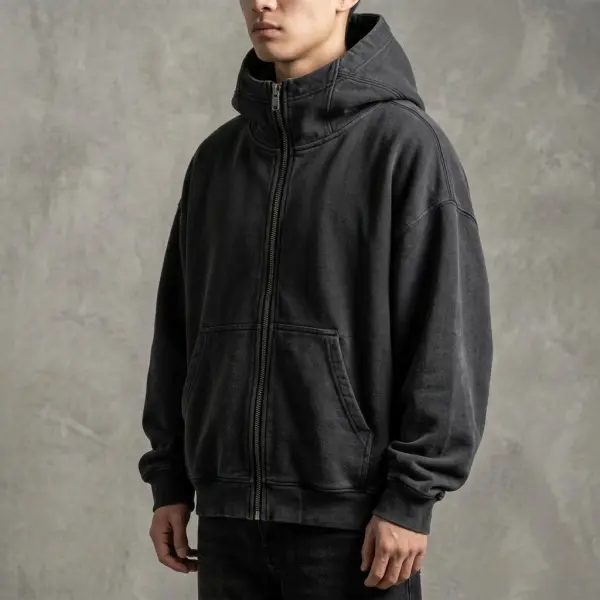 Detail tudung dan ritsleting pada desain jaket streetwear bergaya statement